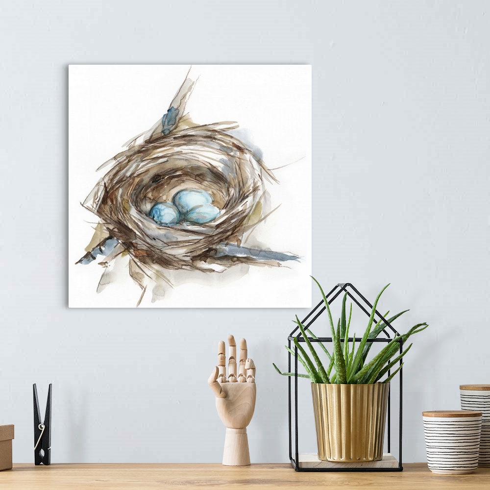 A bohemian room featuring Watercolor painting of a bird's nest with three small blue eggs.