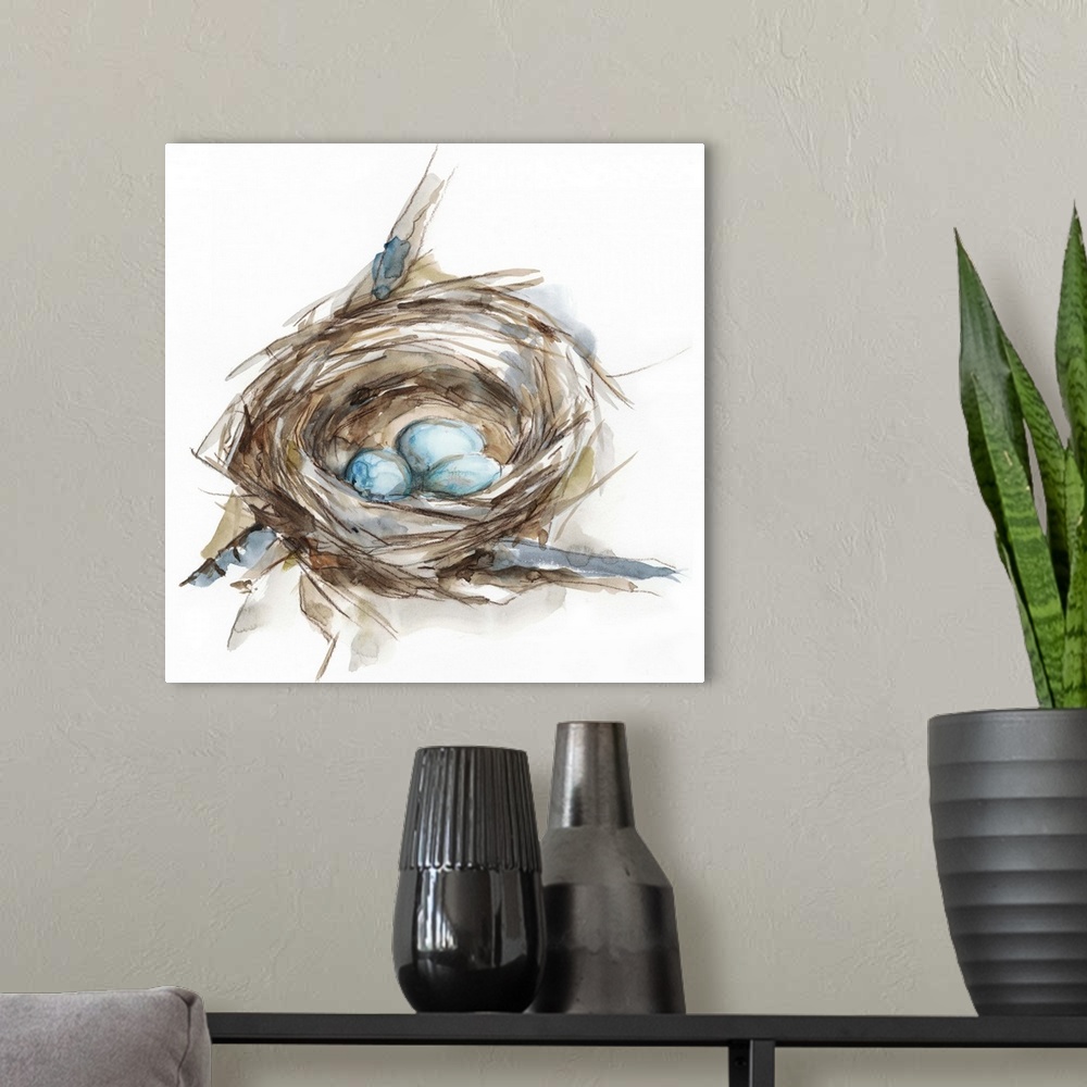 A modern room featuring Watercolor painting of a bird's nest with three small blue eggs.