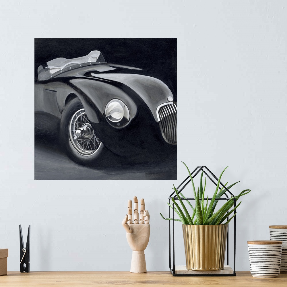 A bohemian room featuring A contemporary painting of a classic vintage car in a polished black finish.