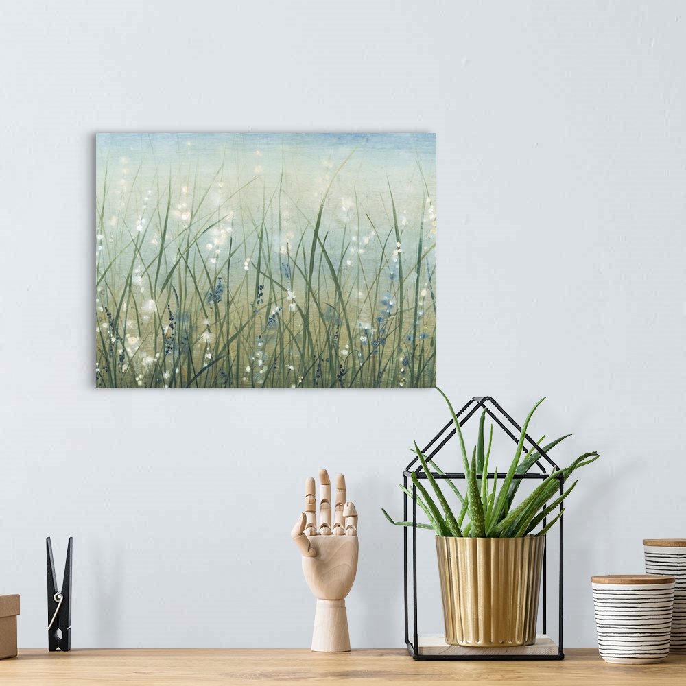 A bohemian room featuring Contemporary painting of a field of wild grasses with small white flowers.