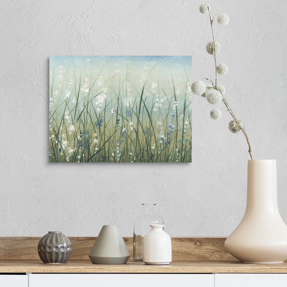 A farmhouse room featuring Contemporary painting of a field of wild grasses with small white flowers.