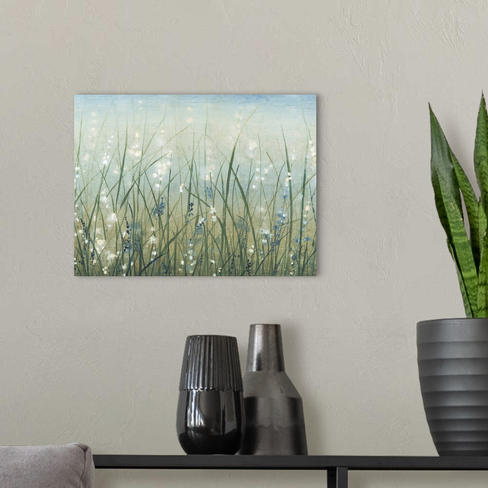 A modern room featuring Contemporary painting of a field of wild grasses with small white flowers.