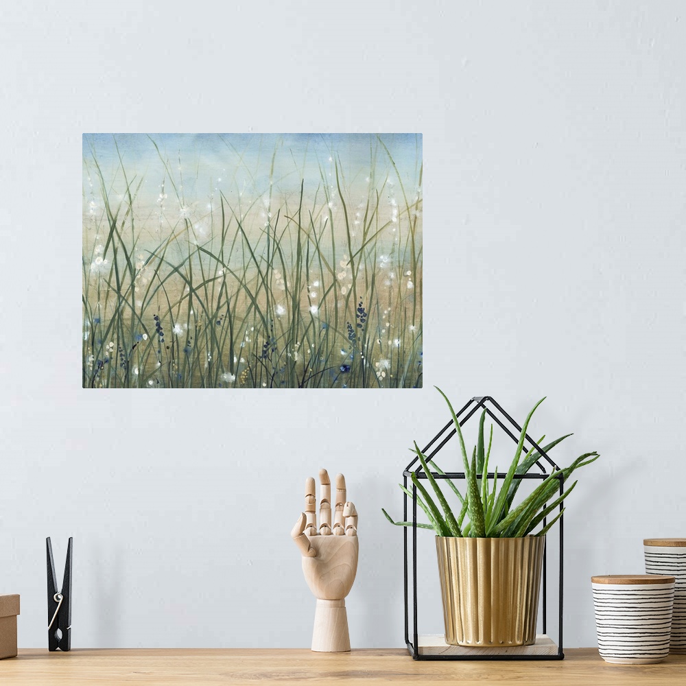 A bohemian room featuring Contemporary painting of a field of wild grasses with small white flowers.