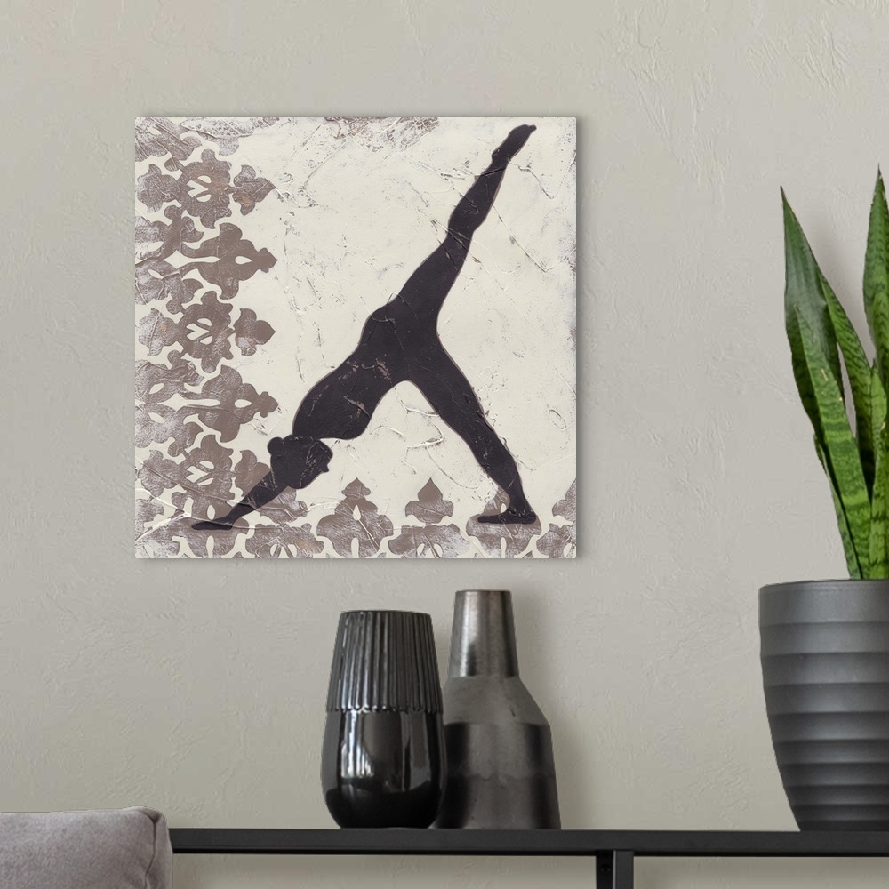 A modern room featuring Decorative print of a yoga pose.