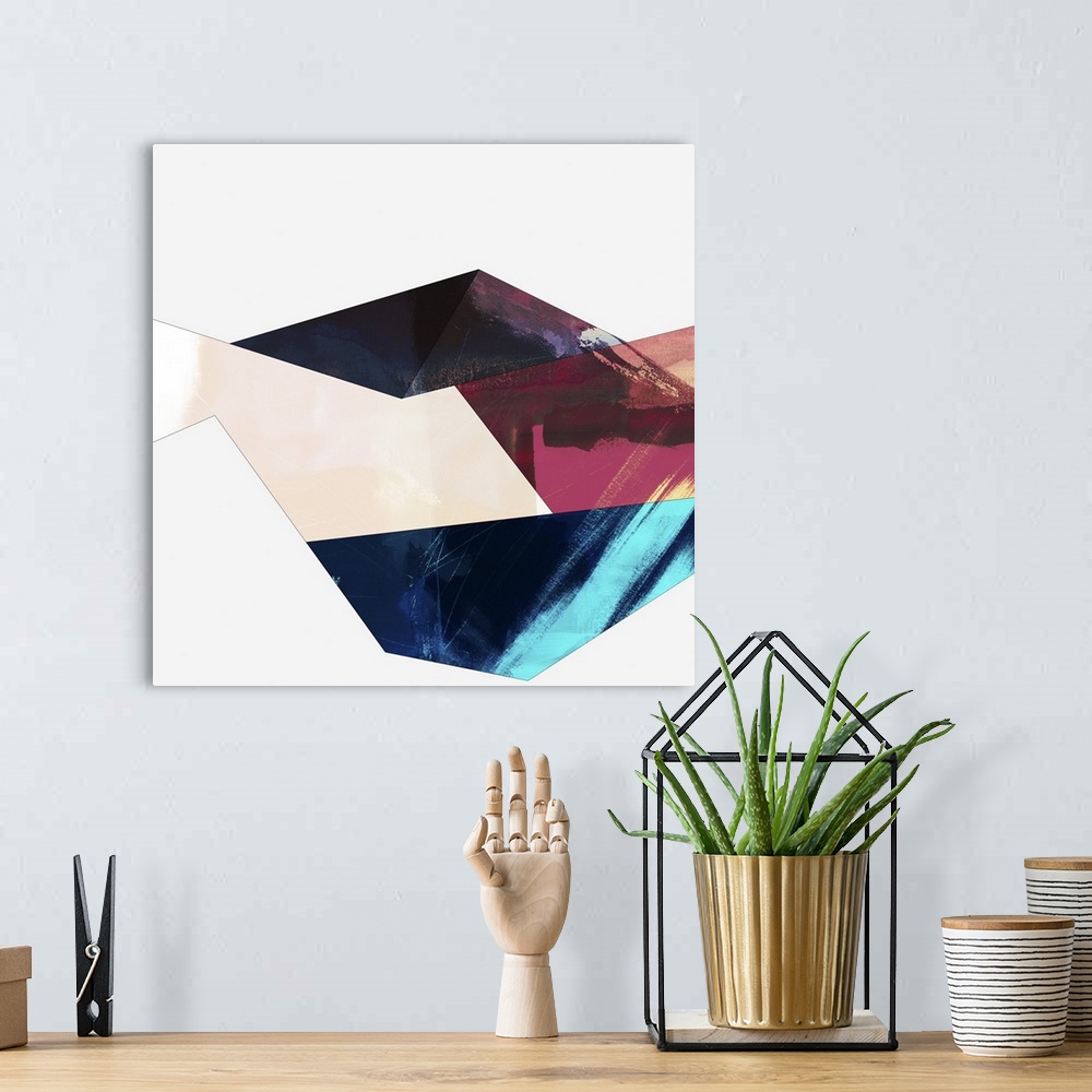 A bohemian room featuring Modern abstract artwork of angular shapes in brown, red, and teal.