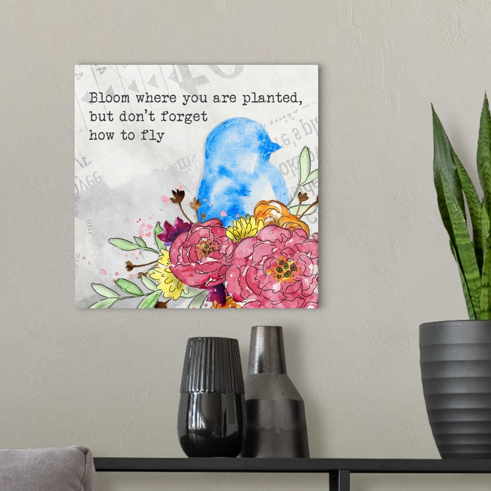 A modern room featuring "Bloom where you are planted, bu don't forget how to fly" along a watercolor image of a blue bird...