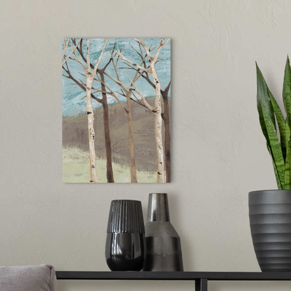 A modern room featuring Contemporary painting of bare branched birch trees against a blue and brown background.