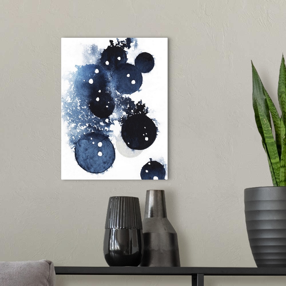 A modern room featuring Contemporary abstract artwork of blue globular shapes with bleed stretching out into empty space.