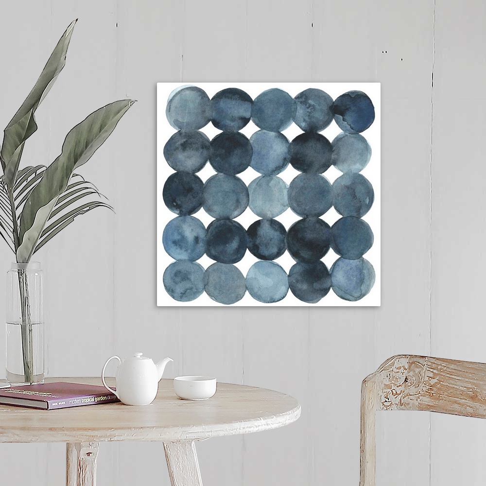 A farmhouse room featuring Dot-patterned abstract watercolor painting of blue-gray tones.