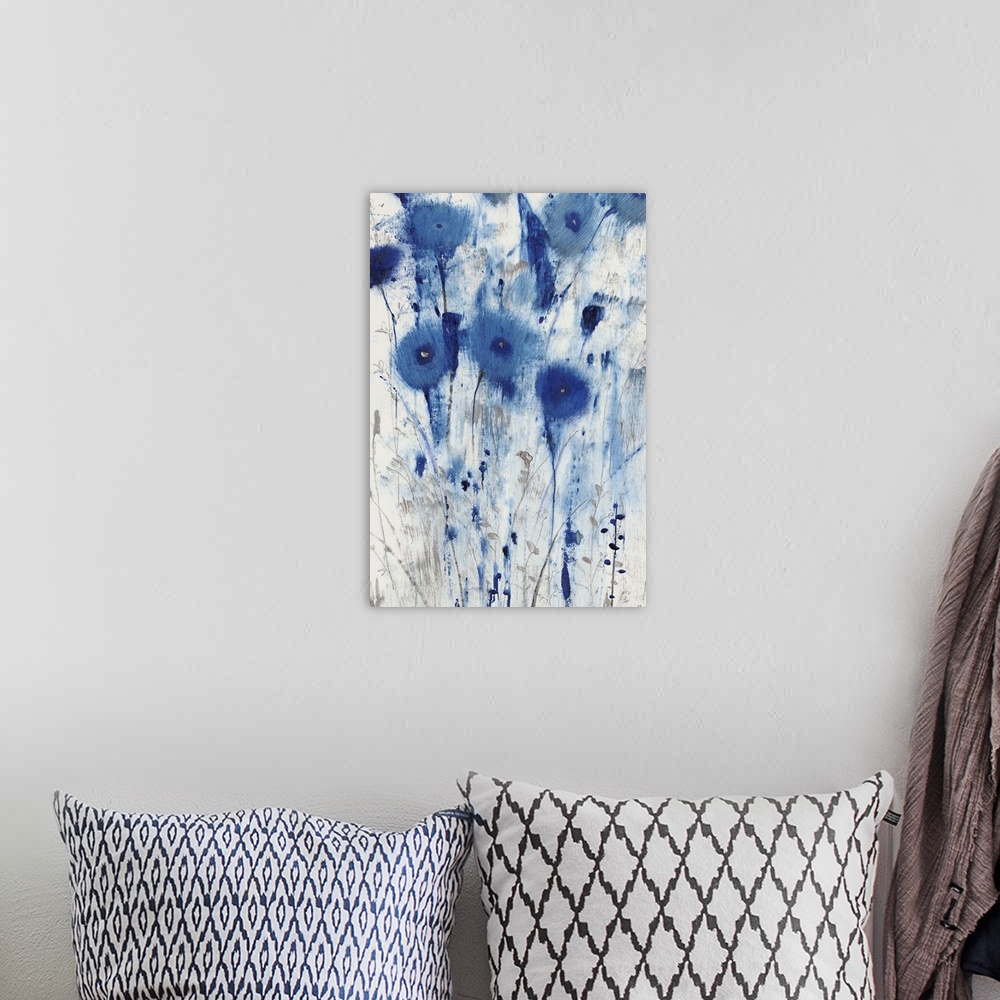 A bohemian room featuring Contemporary painting of soft blue flowers on white.