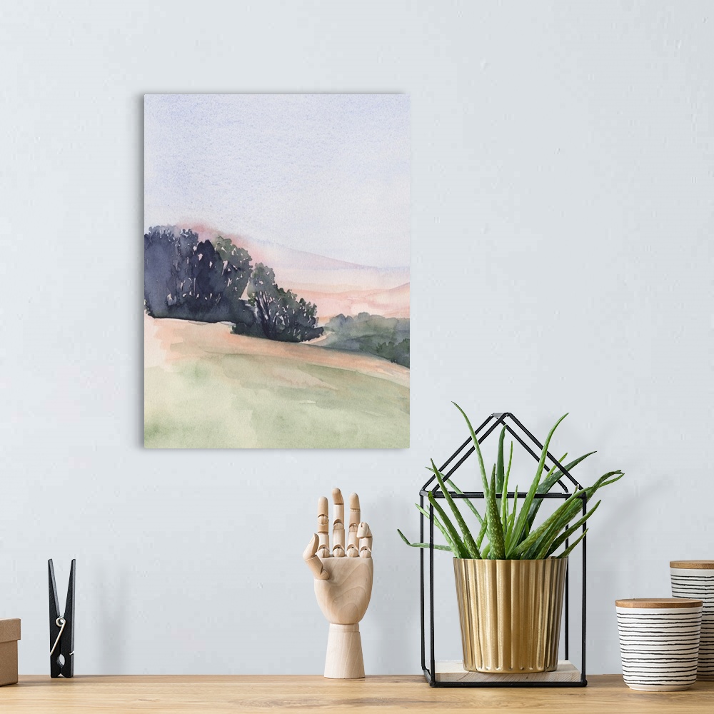 A bohemian room featuring Vertical watercolor landscape of rolling hills of pink, green and blue, lined by trees with a blu...