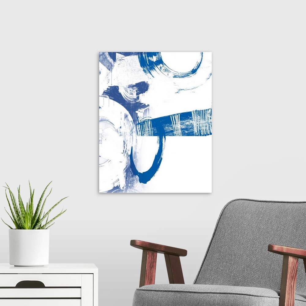 A modern room featuring Contemporary abstract artwork in contrasting deep blue and stark white.