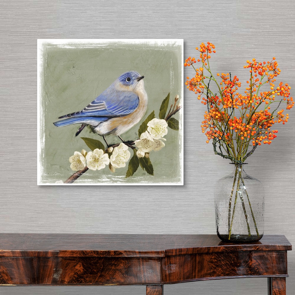A traditional room featuring Decorative artwork of a bluebird is perched on a cherry blossom branch on a muted green background.