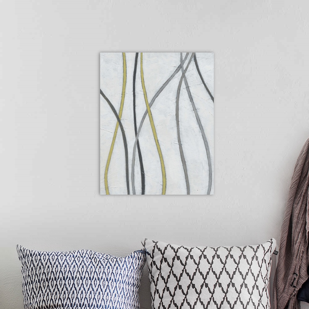 A bohemian room featuring Abstract artwork of thin vines weaving along a white background.