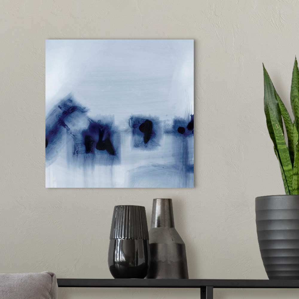 A modern room featuring Contemporary abstract painting in inky blue hues.