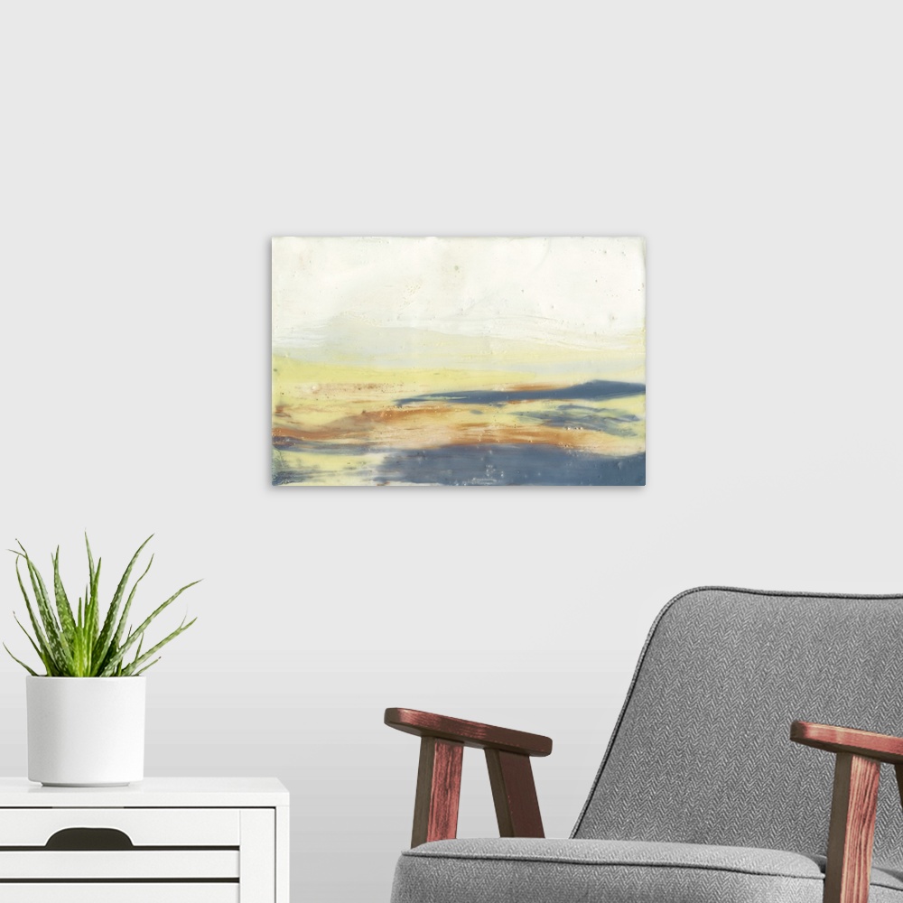 A modern room featuring Watercolor abstract artwork in soft, blurred layers of orange and blue.