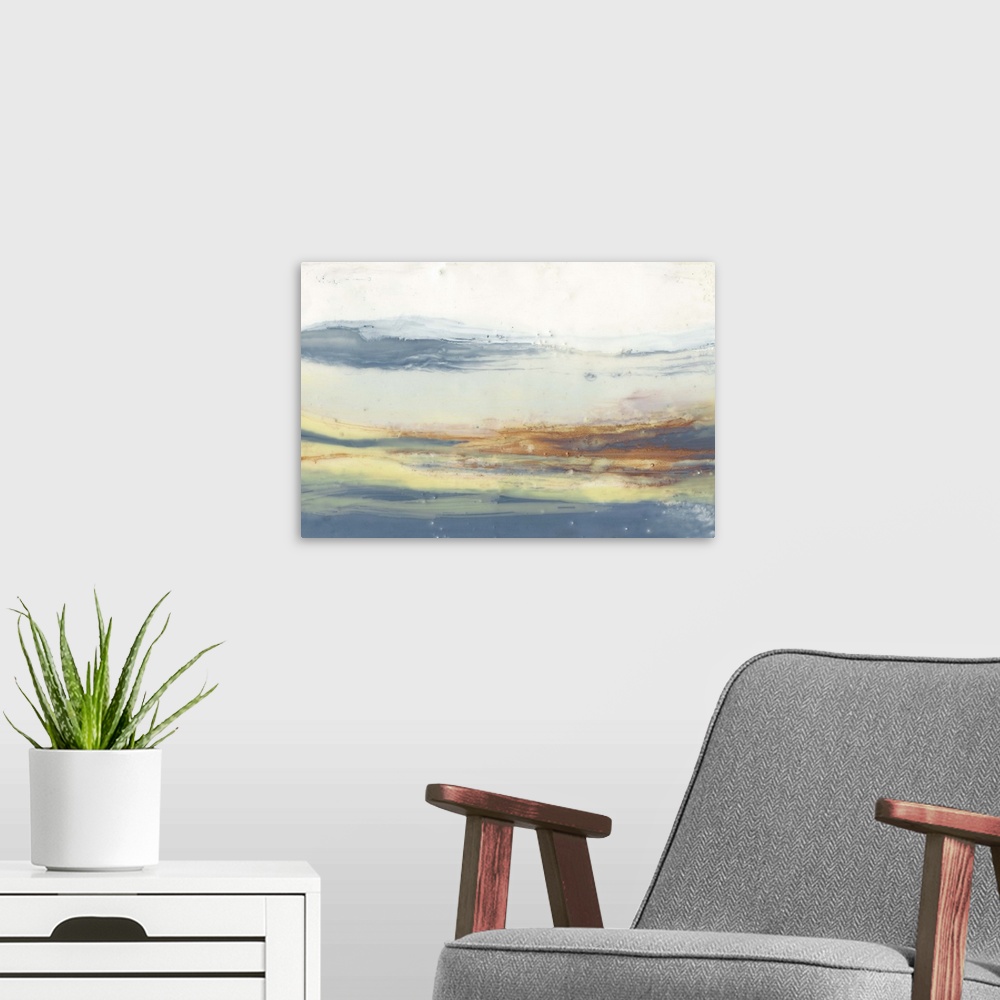 A modern room featuring Watercolor abstract artwork in soft, blurred layers of orange and blue.