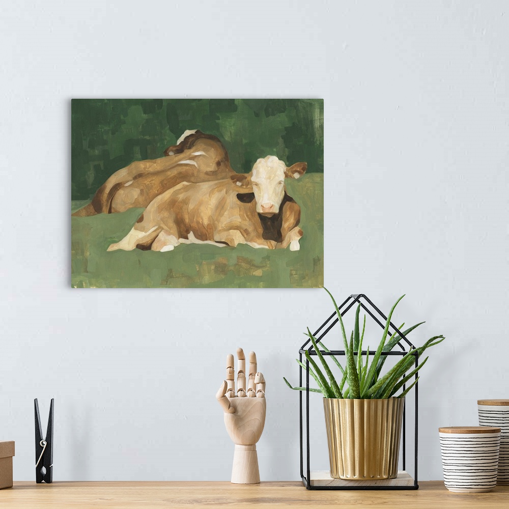 A bohemian room featuring Contemporary portrait of two cows lying down on a green landscape.