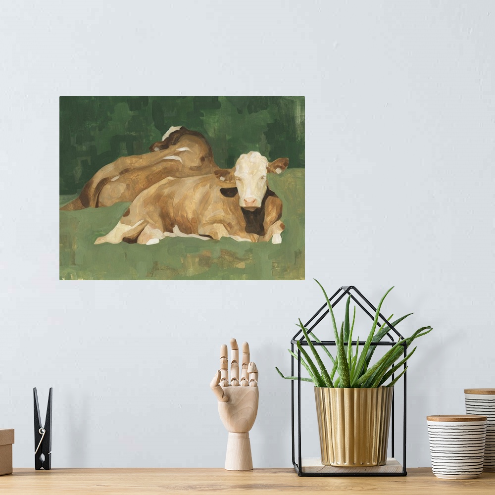 A bohemian room featuring Contemporary portrait of two cows lying down on a green landscape.