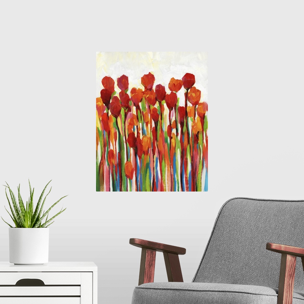 A modern room featuring Bright contemporary painting of red flowers with rainbow stems.