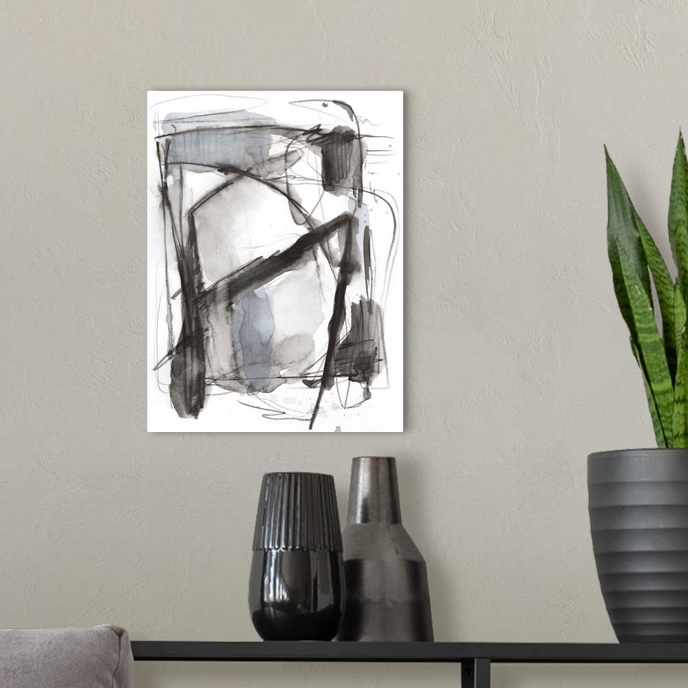 A modern room featuring Abstract artwork in quick, sketchy grey lines and watercolor blocks.