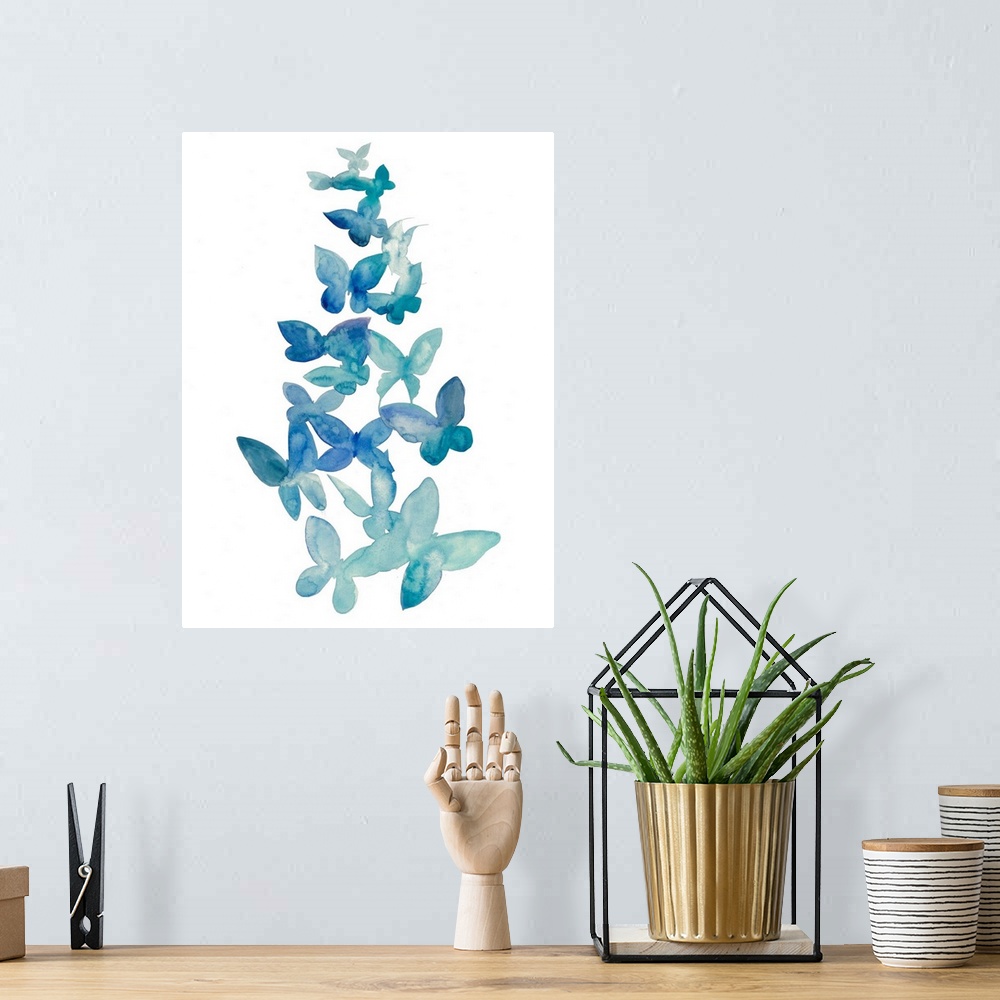 A bohemian room featuring Blue watercolor butterflies ascending against a white background.