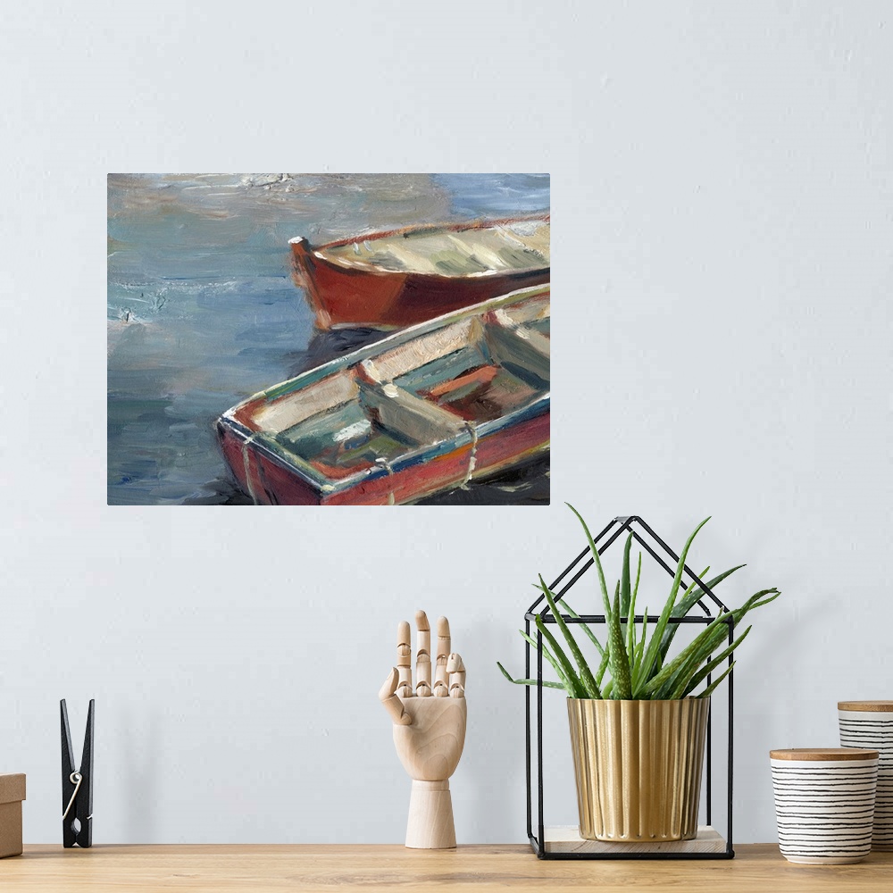 A bohemian room featuring Contemporary painting of red rowboats sitting on the water.
