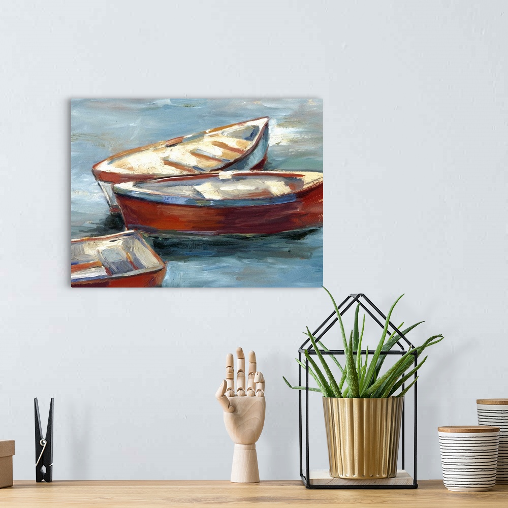 A bohemian room featuring Contemporary painting of red rowboats sitting on the water.