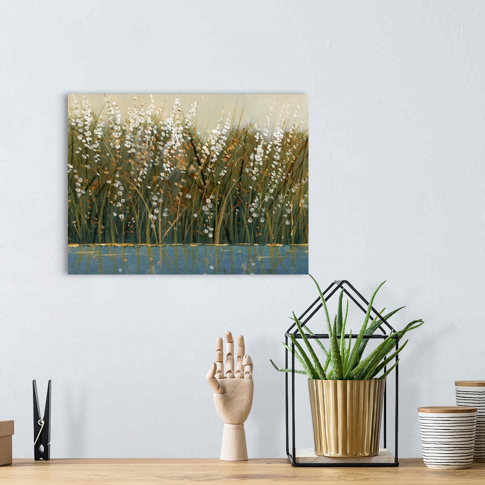 A bohemian room featuring Contemporary painting of wild flowering grasses by the water.