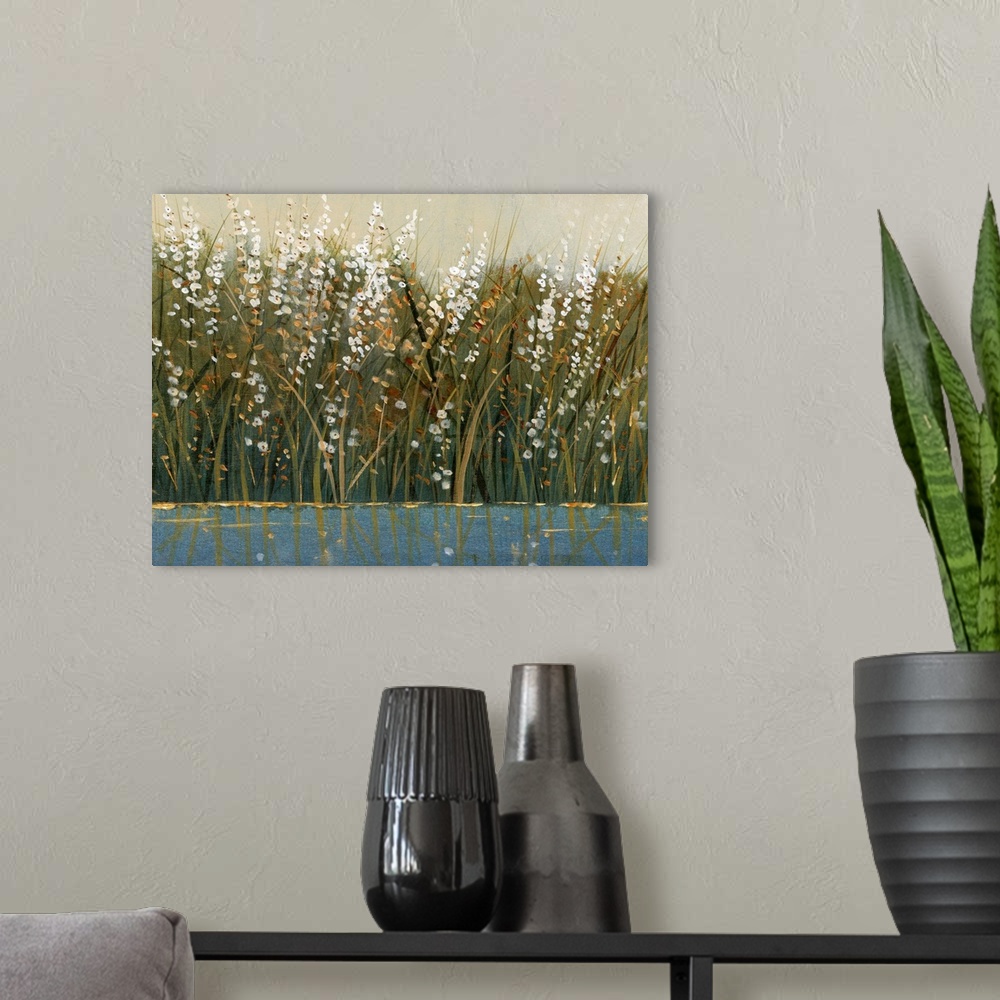 A modern room featuring Contemporary painting of wild flowering grasses by the water.