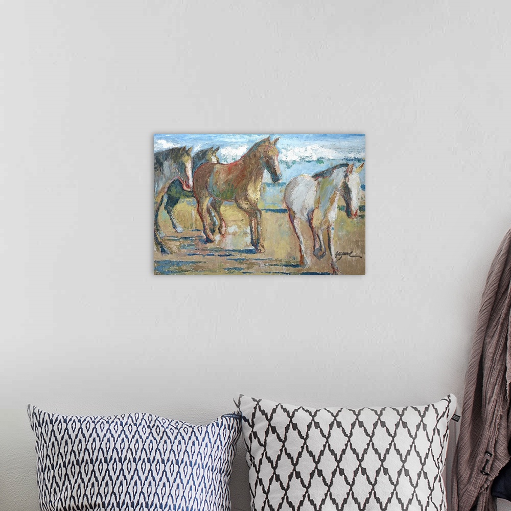 A bohemian room featuring Contemporary art print of a herd of horses trotting along the beach.