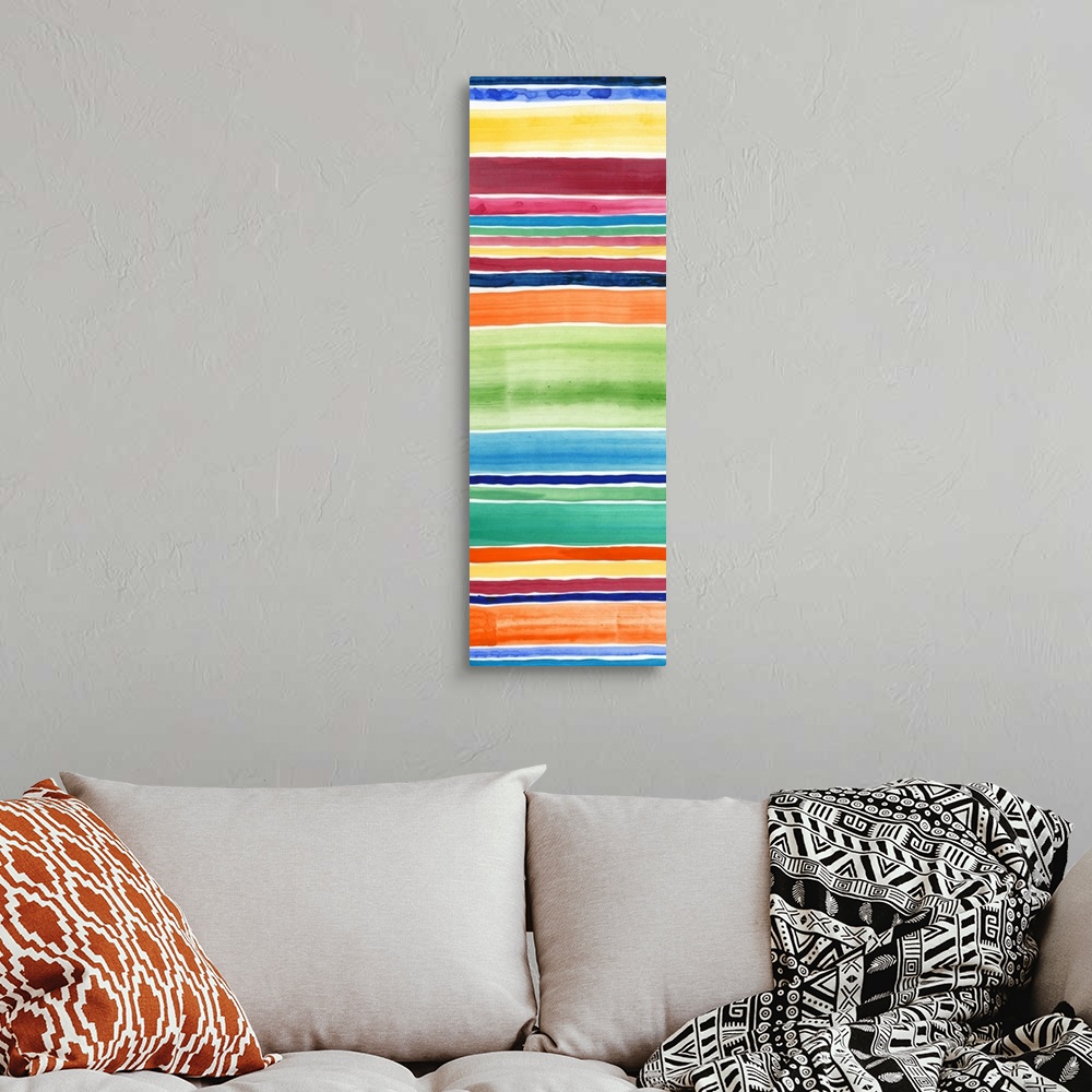 A bohemian room featuring Abstract art print of horizontal stripes in tropical rainbow colors.
