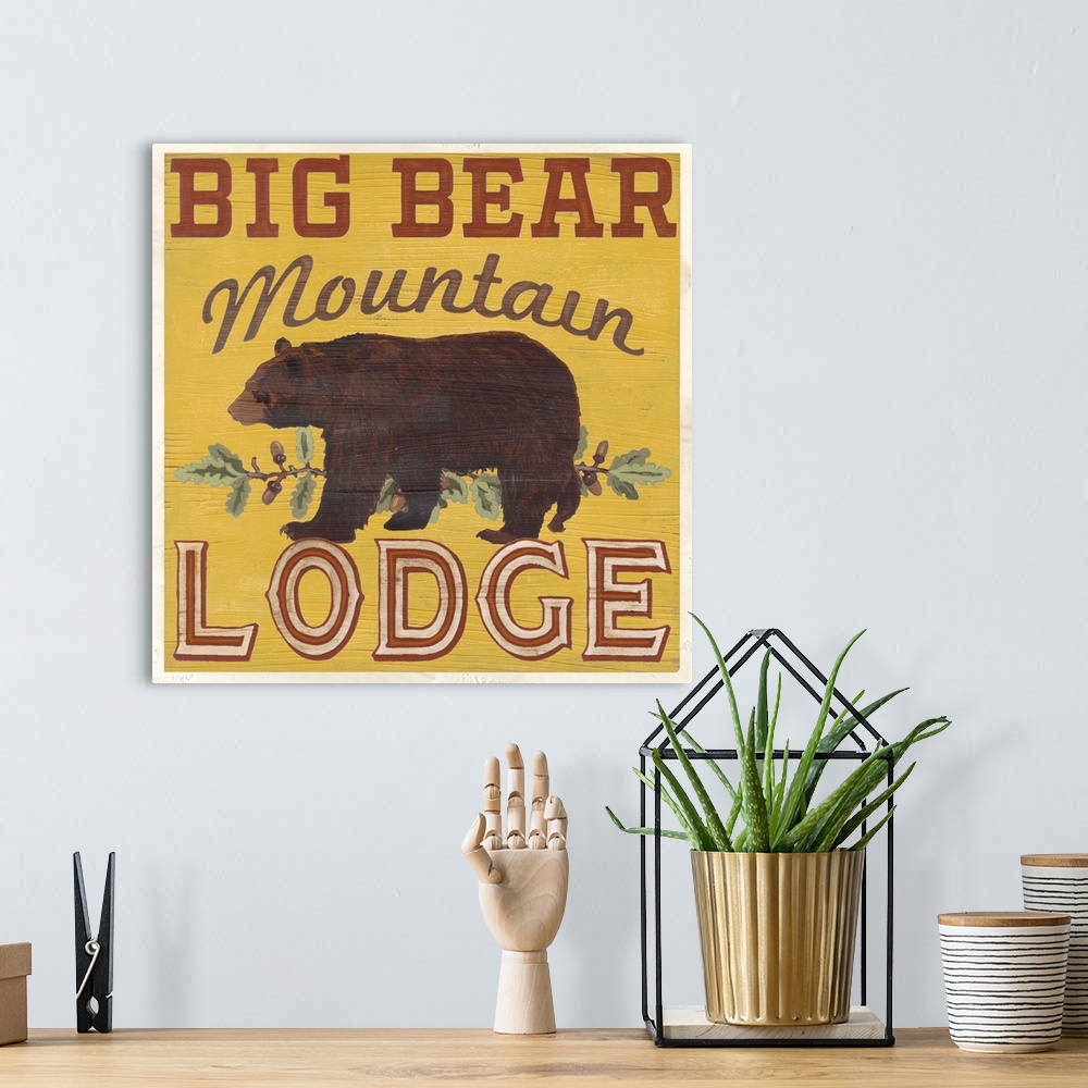 A bohemian room featuring Decorative sign for a cabin or lodge that reads "Big Bear Mountain Lodge."