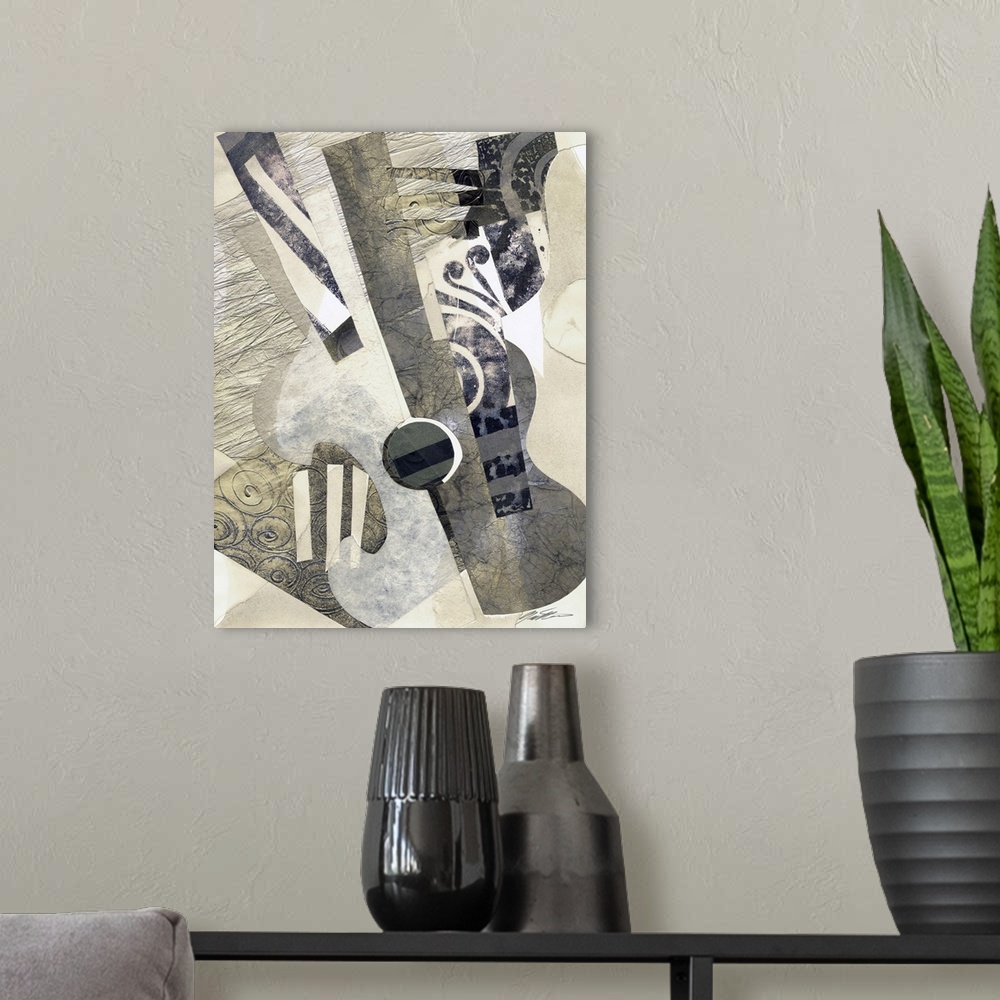 A modern room featuring Contemporary collage of a guitar in a cubist style.