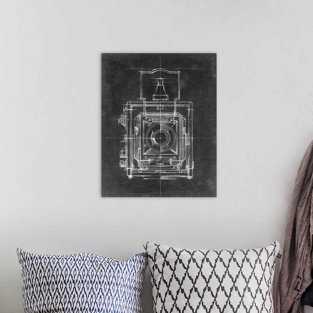 A bohemian room featuring Contemporary home decor artwork of a chalkboard style technical drawings of cameras.