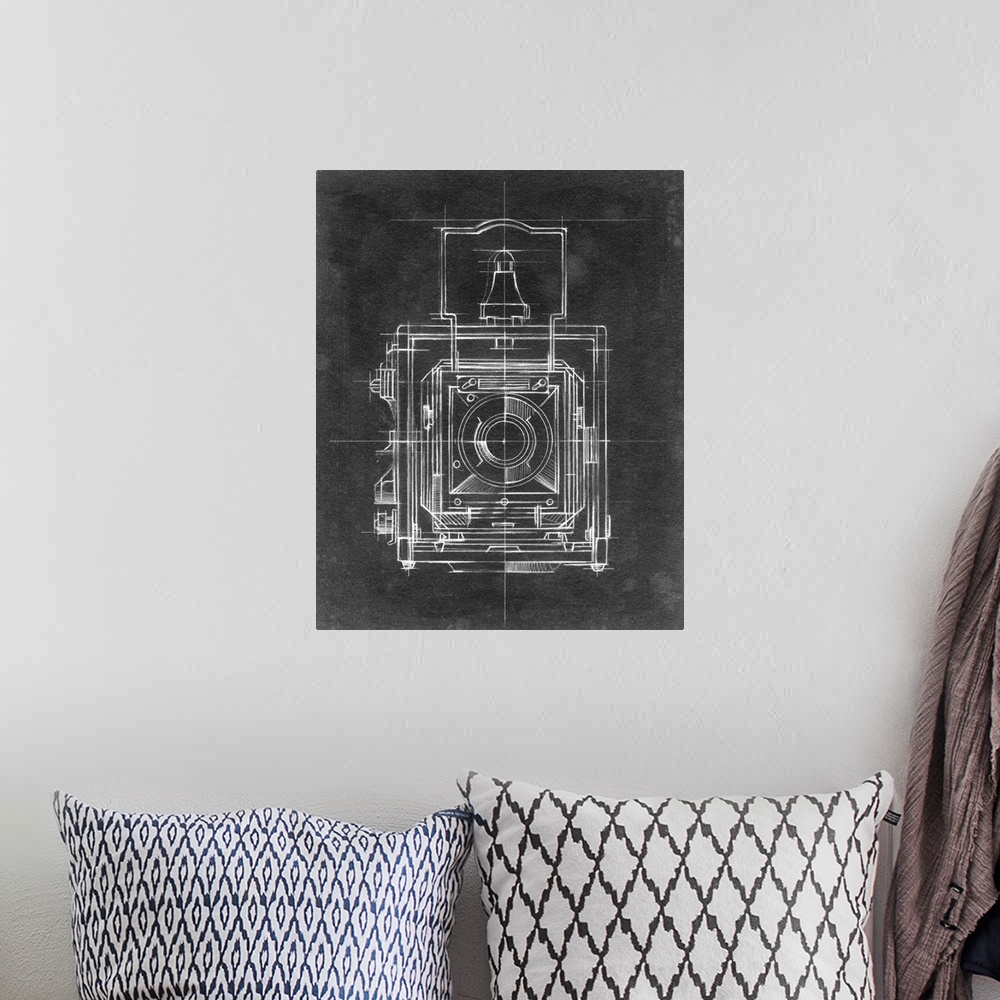 A bohemian room featuring Contemporary home decor artwork of a chalkboard style technical drawings of cameras.