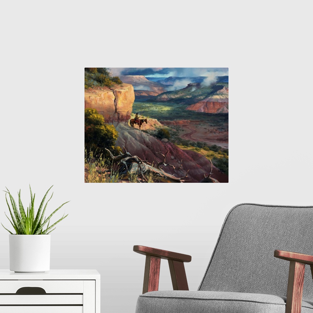 A modern room featuring Contemporary Western artwork of a cowboy and his horse on a treacherous trail in the mountains.