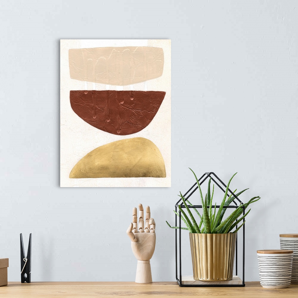 A bohemian room featuring A contemporary, mid-century modern painting of three organic shapes resembling stacked up bowls