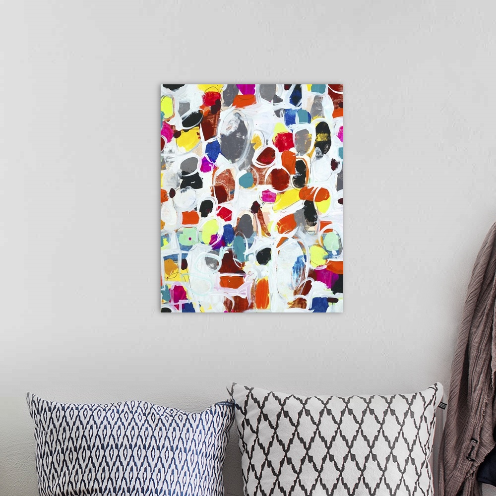 A bohemian room featuring Contemporary abstract painting using wild colors and little organic shapes.