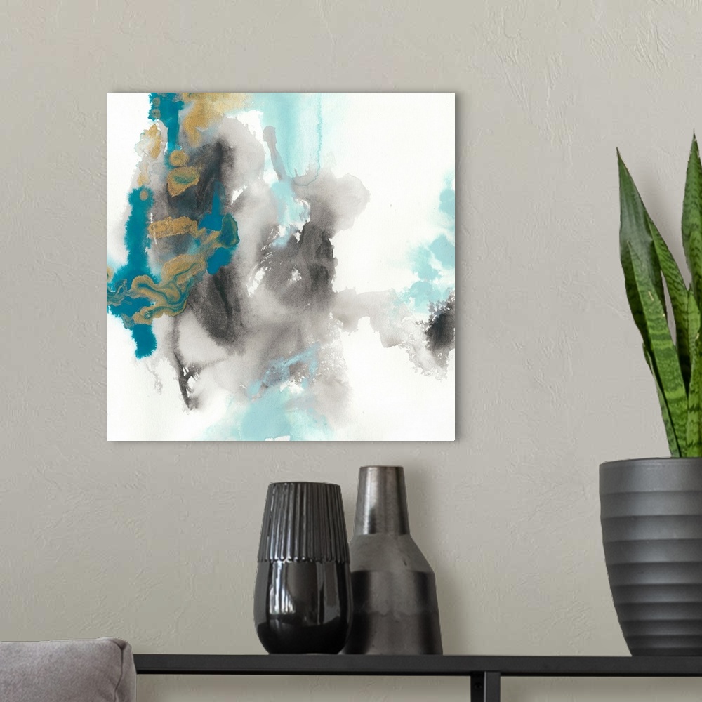 A modern room featuring Watercolor abstract art in blue and grey on white.