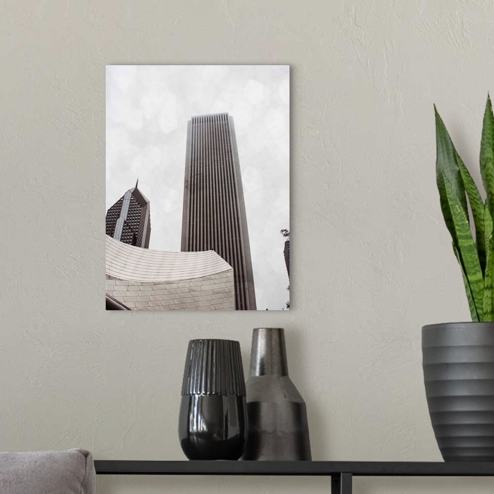 A modern room featuring In this photograph of skyscrapers, elegant architectural details overlap one another to create a ...