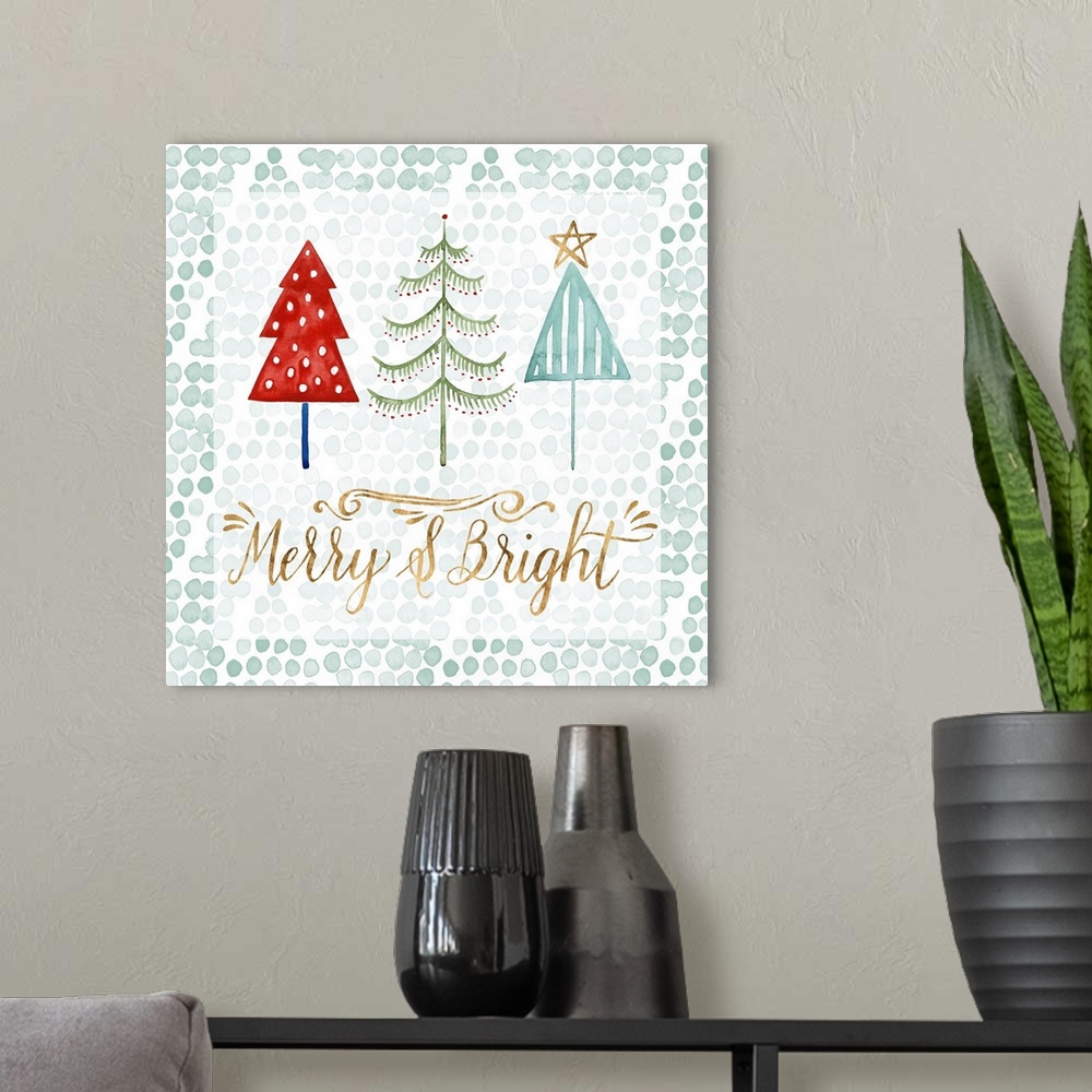 A modern room featuring A trio of three colorful patterned Christmas trees with gold script.