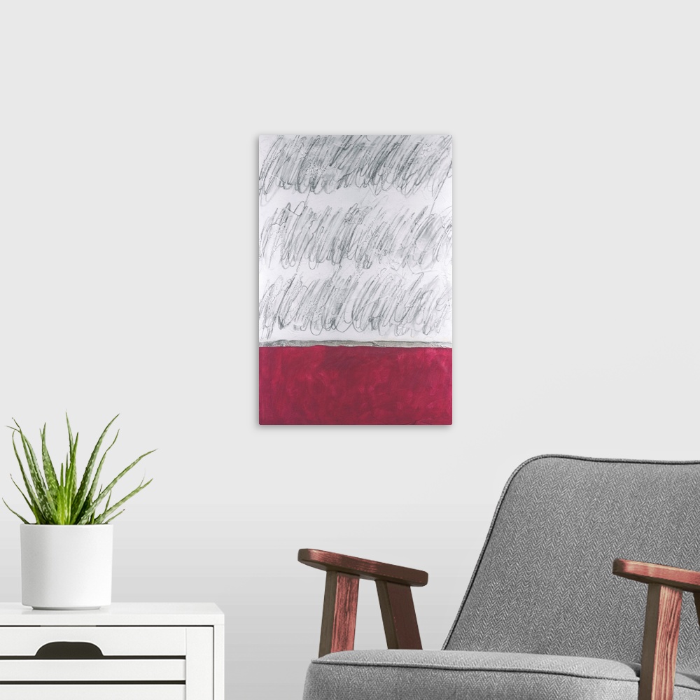 A modern room featuring A vertical contemporary abstract image with charcoal scribbles above a solid red block