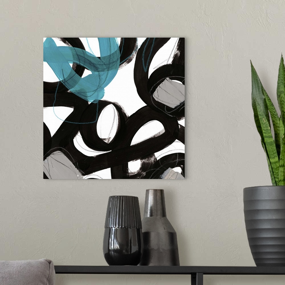 A modern room featuring Contemporary abstract painting with bold black shapes with colorful streaks.