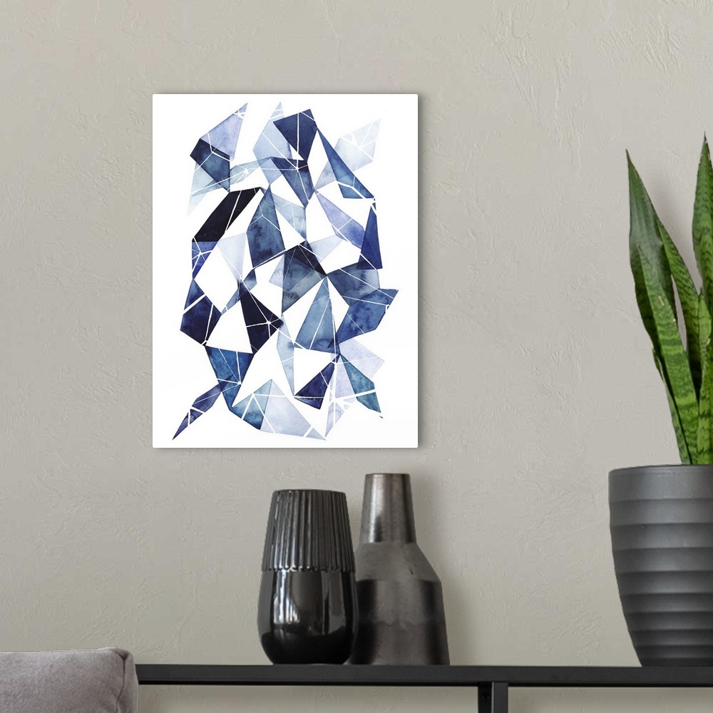 A modern room featuring Abstract watercolor geometric artwork in shades of blue.