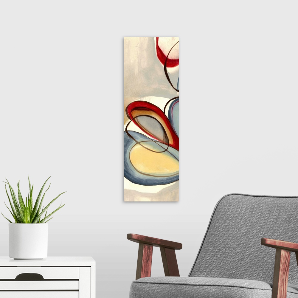A modern room featuring Vertical contemporary painting on a large wall hanging of large, intersecting circular patters in...
