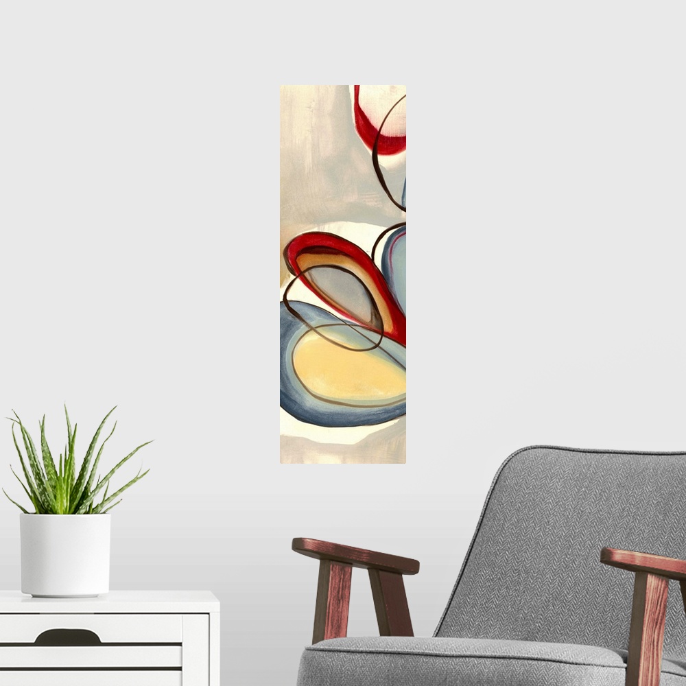 A modern room featuring Vertical contemporary painting on a large wall hanging of large, intersecting circular patters in...