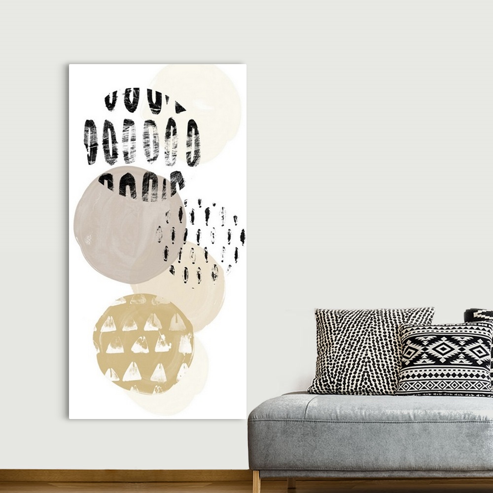 A bohemian room featuring Abstract painting of circular patterned shapes in black, grey, and gold on white.