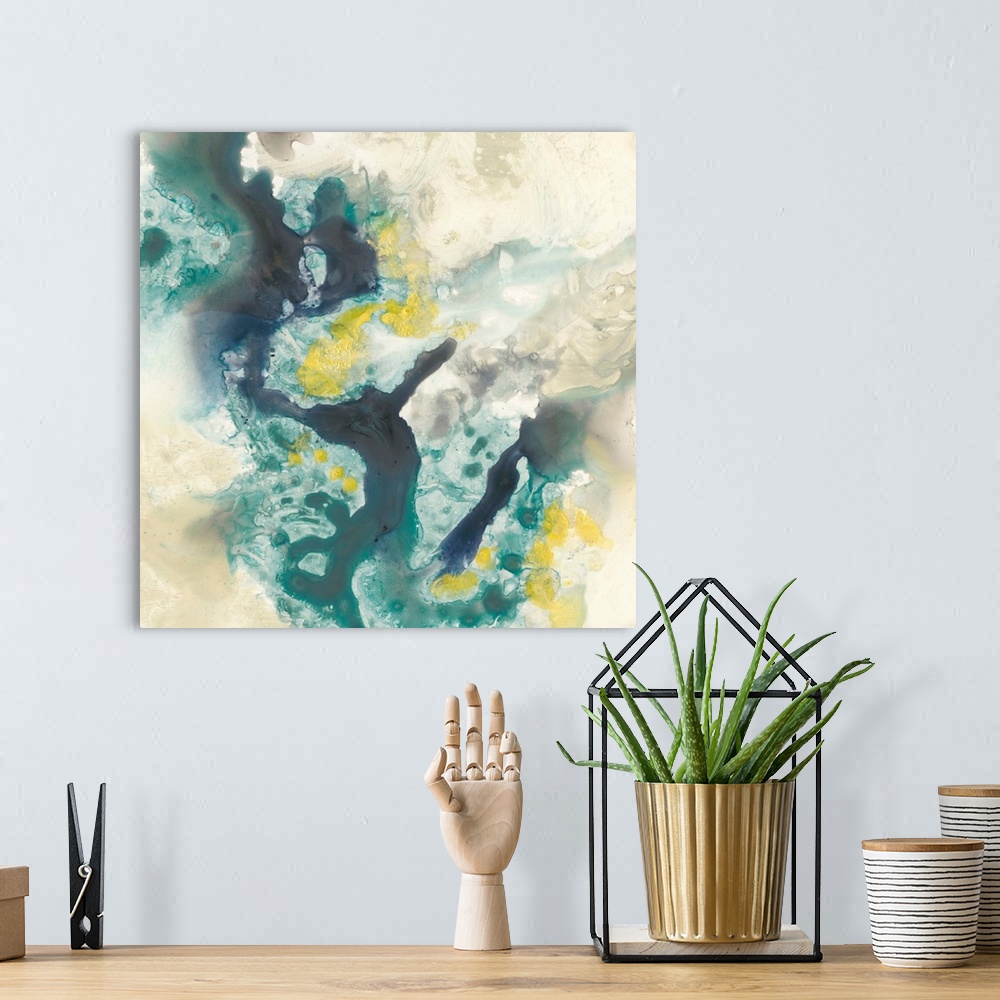 A bohemian room featuring Abstract artwork of fluid paint in shades of green, blue and yellow glide against a khaki color o...