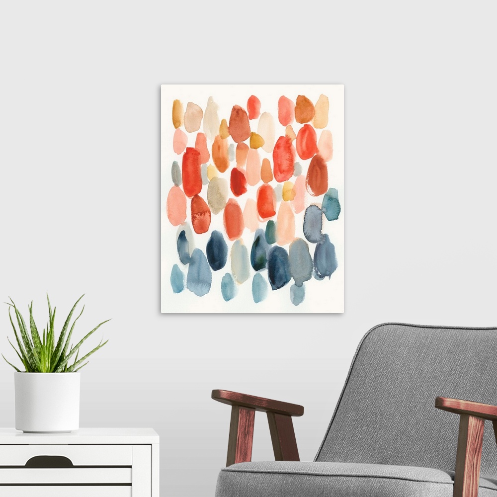 A modern room featuring Watercolor abstract with oblong shapes in indigo, coral, and orange colors on a white background.